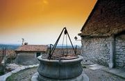 A well and traditional Karst houses