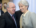 Slovenian Finance Minister Andrej Bajuk talks with French Finance Minister Christine Lagarde prior to the start of the Eurogroup council meeting in Brussels.