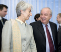 Slovenian Finance Minister Andrej Bajuk talks with French Finance Minister Christine Lagarde prior to the start of the Eurogroup council meeting in Brussels.