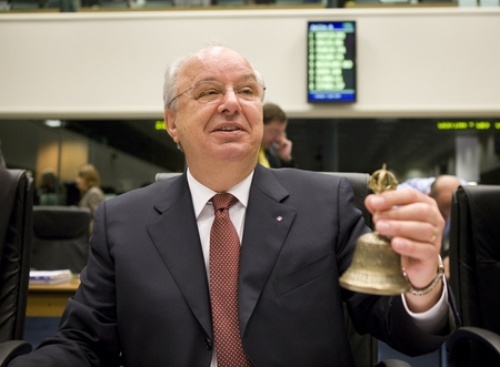 Slovenian Minister Andrej Bajuk rings the bell to start the Council
