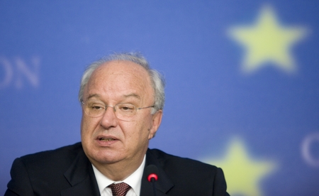 Slovenian Finance Minister Andrej Bajuk talks to media after the Ecofin council meeting