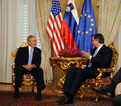 Presidents George W. Bush and Danilo Türk in friendly conversation
