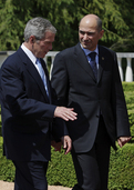 George W. Bush and Janez Janša in friendly conversation