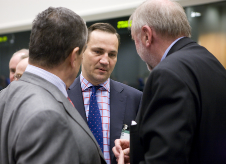 Czech Minister of Foreign Affairs Karel Schwarzenberg (L) is talking with Slovenian Minister of Foreign Affairs, President of the Council Dimitrij Rupel (R) and Polish counterpart Radoslaw Sikorski (C) prior to the start of the general affairs Council meeting