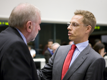 Slovenian Minister of Foreign Affairs, President of the GAERC Council Dimitrij Rupel (L) is talking with Finnish Minister of Foreign Affairs Alexander Stubb (R) prior to the start of the general affairs Council meeting