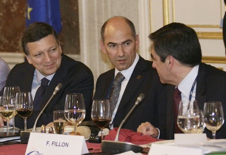 President of the European Commission José Manuel Barroso and Slovenian Prime Minister Janez Janša talk to the Danish Prime Minister Anders Fogh Rasmussen