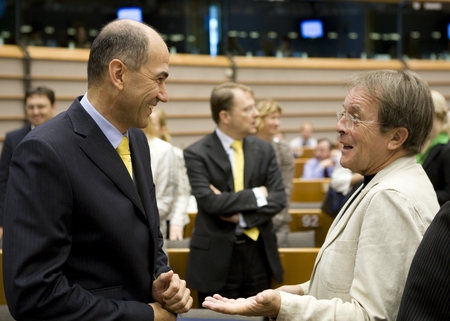 Slovenian Prime Minister Janez Janša talks to the Slovenian MEP Miha Brejc