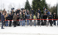 Family photo of photographers and cameramen in front of Congress Centre Brdo