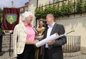 EU Agriculture and Rural Development Commissioner Mariann Fischer Boel receiving a Graft of the oldest grape vine in the world from the Mayor of Maribor Franc Kangler