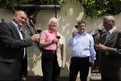 Mayor of Maribor Franc Kangler, European Commissioner Mariann Fischer Boel and Minister Iztok Jarc are proposing a toast in front of the oldest vine in the world (Maribor)