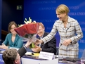 Minister Mojca Kucler Dolinar received flowers from Thomas Brandtner (General Secretariat of the Council of the EU) in thanks for her successful work during the Slovenian Presidency